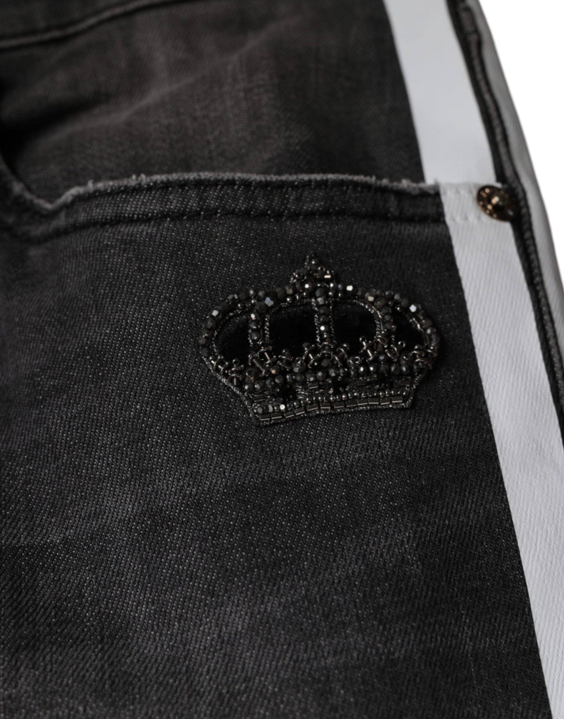 Pair of jeans with a crown embroidery on the back pocket