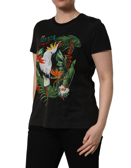 A black t-shirt with a tropical jungle print on the front