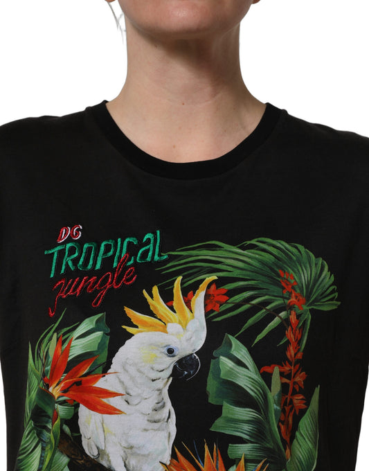 A black t-shirt with a tropical jungle print featuring a parrot and palm leaves
