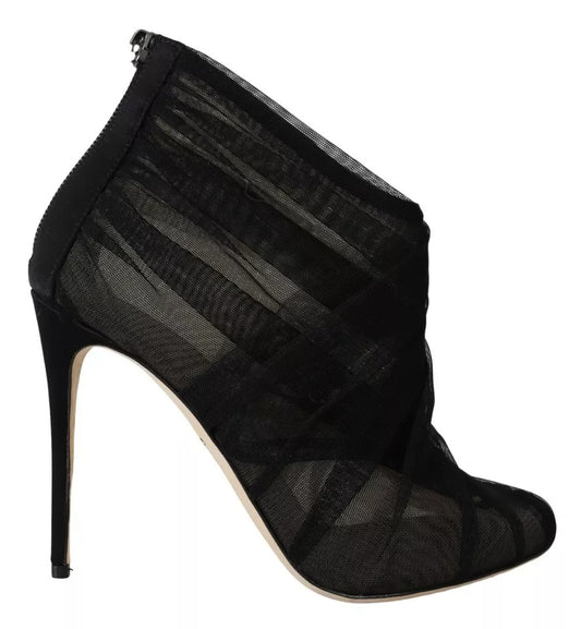 Black high heel boot with lace up front