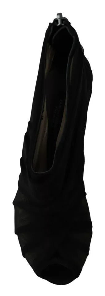 Black coat hanging on a hanger
