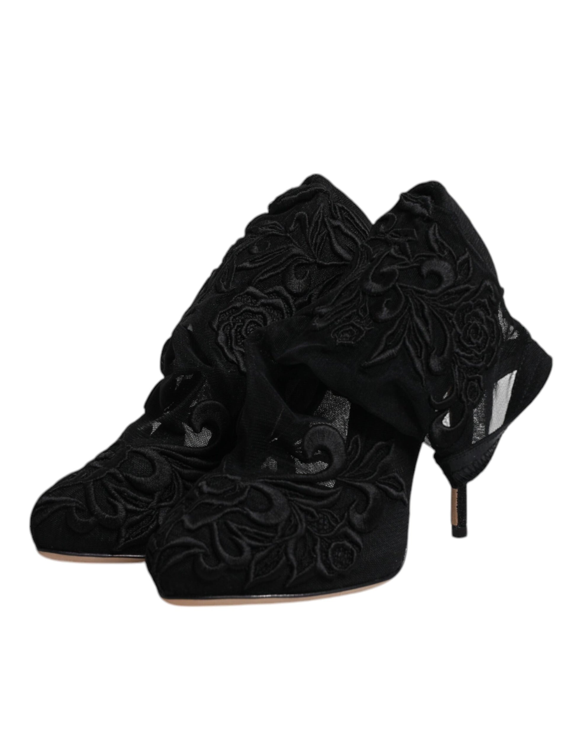 Black high heel shoes with embroidered design on toe