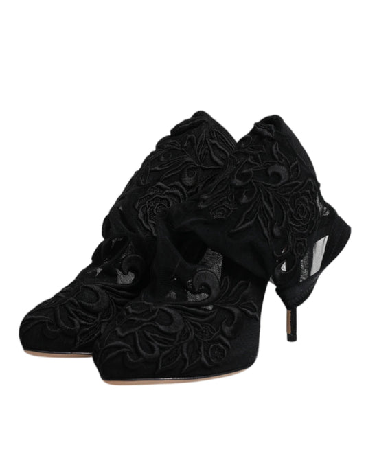 Black high heel shoes with embroidered design on toe