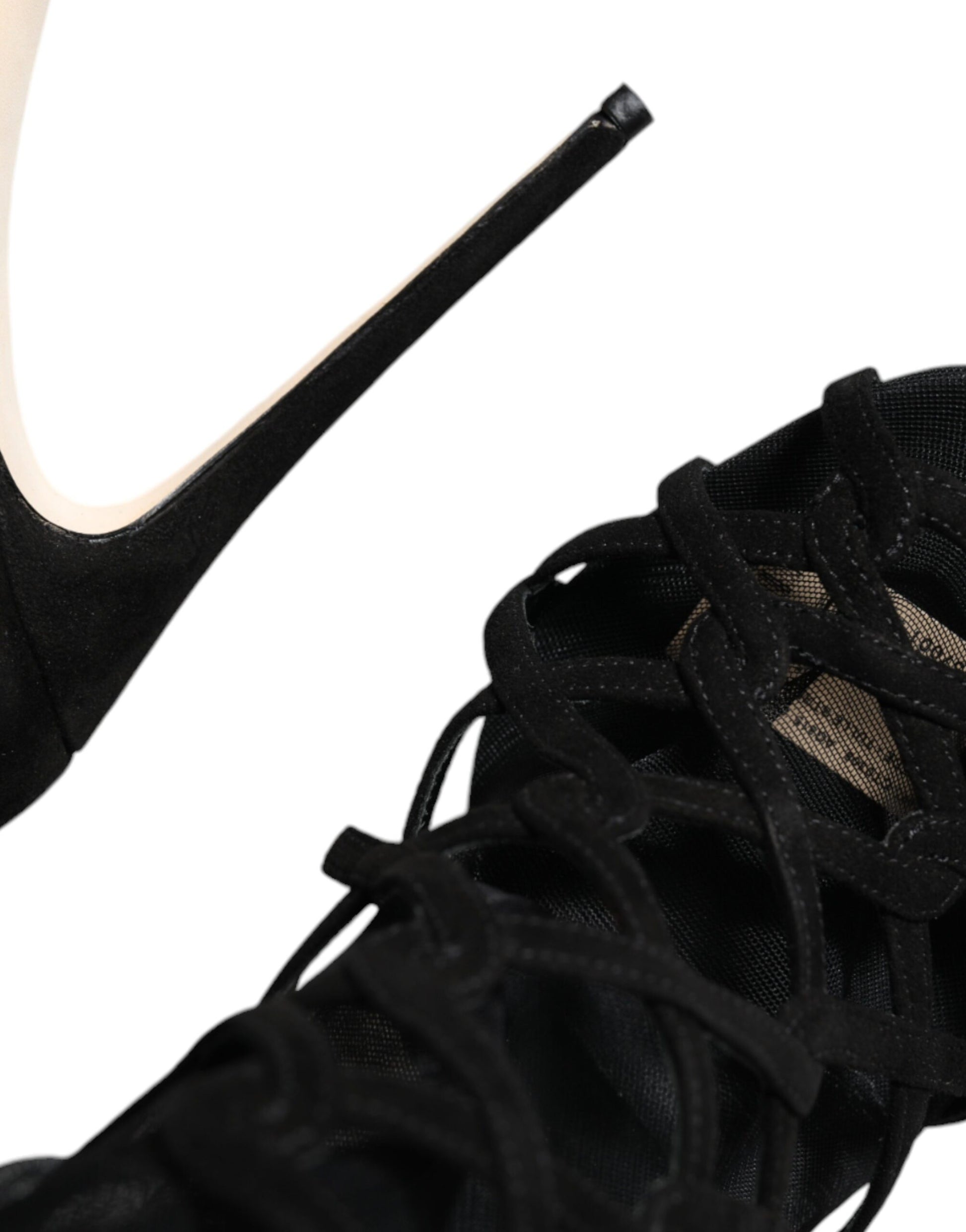 High heel shoe with black straps and a pointed toe