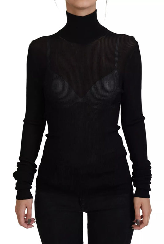 Black long sleeve top with cutouts on shoulders