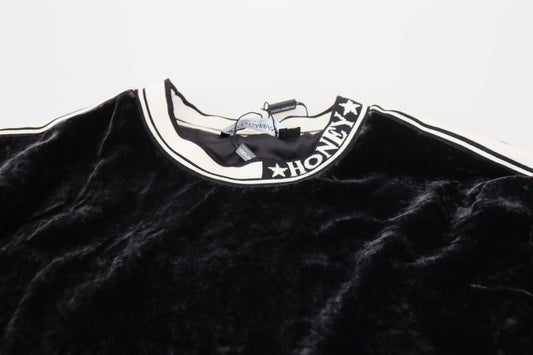Black fabric with embroidered logo