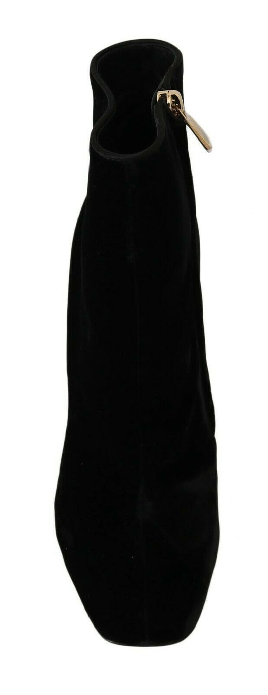 Black velvet strap with a gold buckle