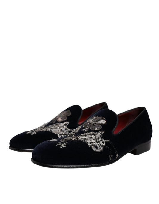 Pair of black velvet loafers with floral embroidery and gold buckle