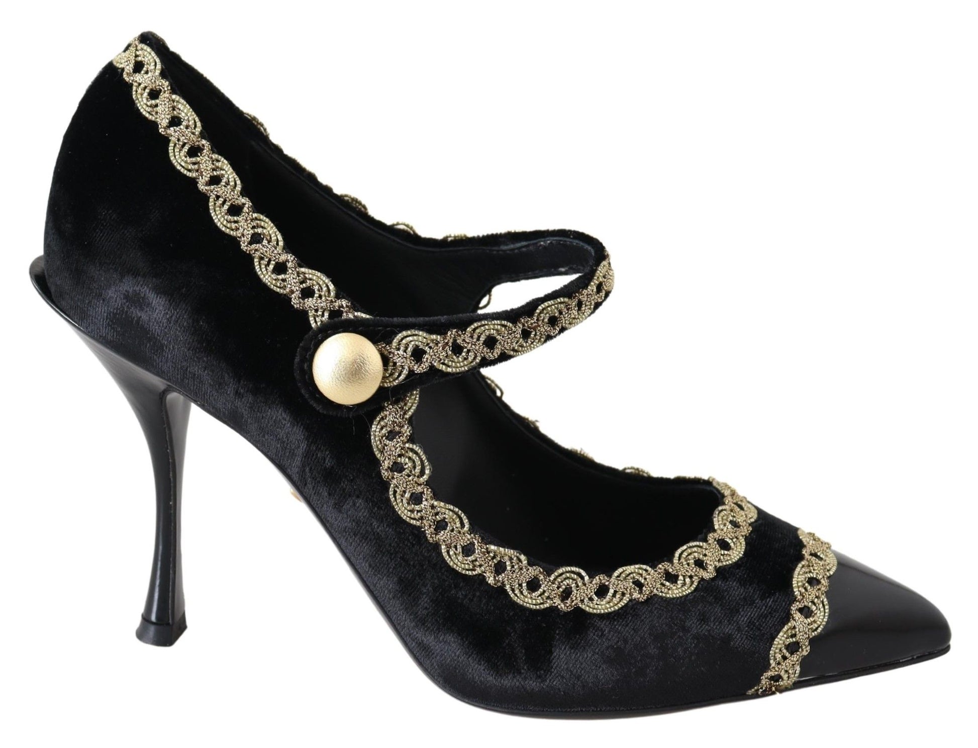 Black velvet high heel shoes with gold accents and a bow on the ankle