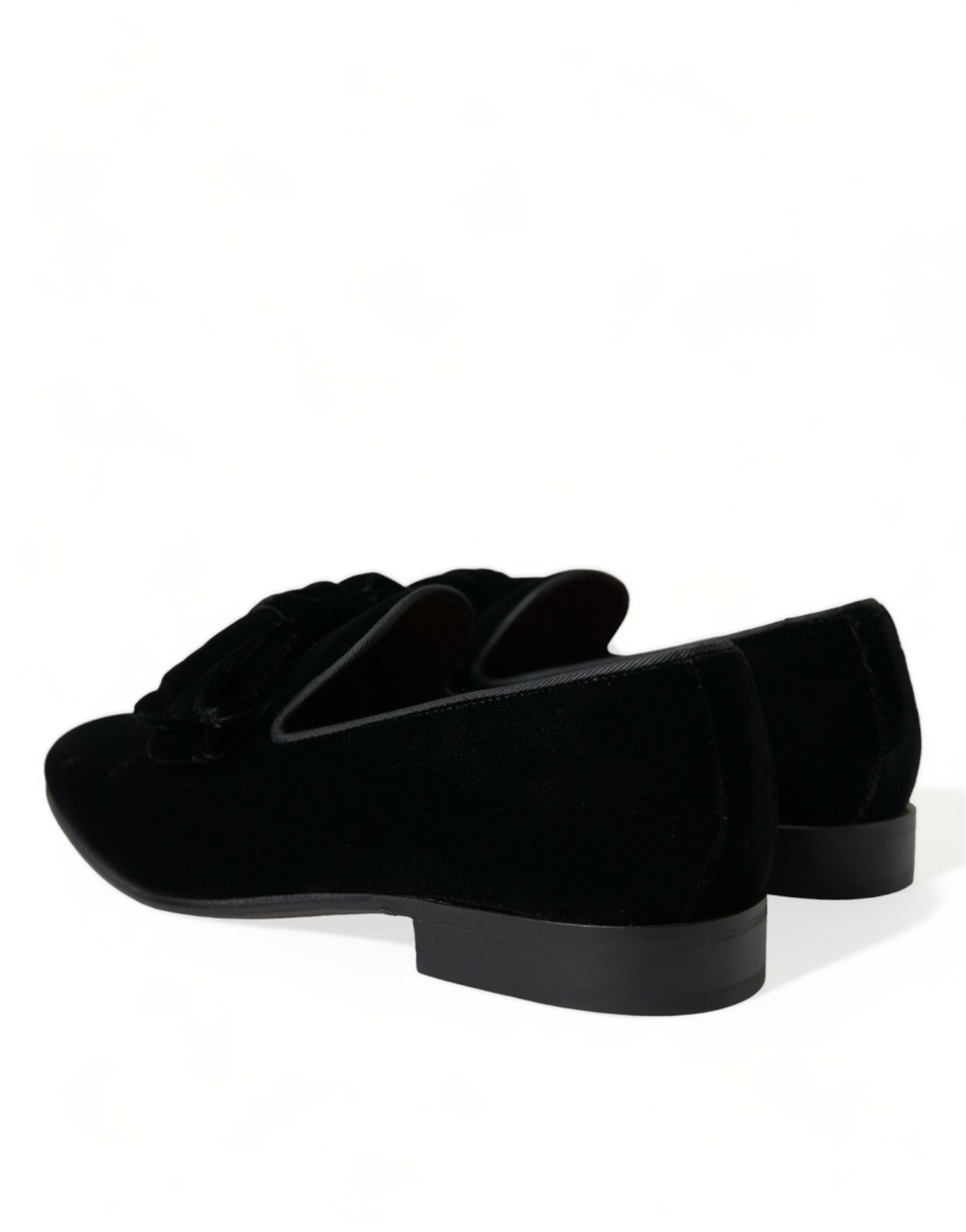Pair of black velvet shoes with a low heel and elastic panels for comfort