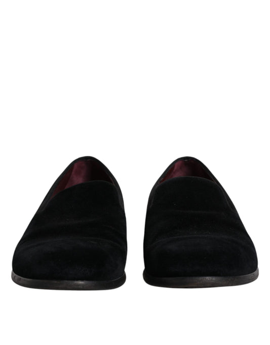 Pair of black velvet loafers with red trim, formal men's dress shoes