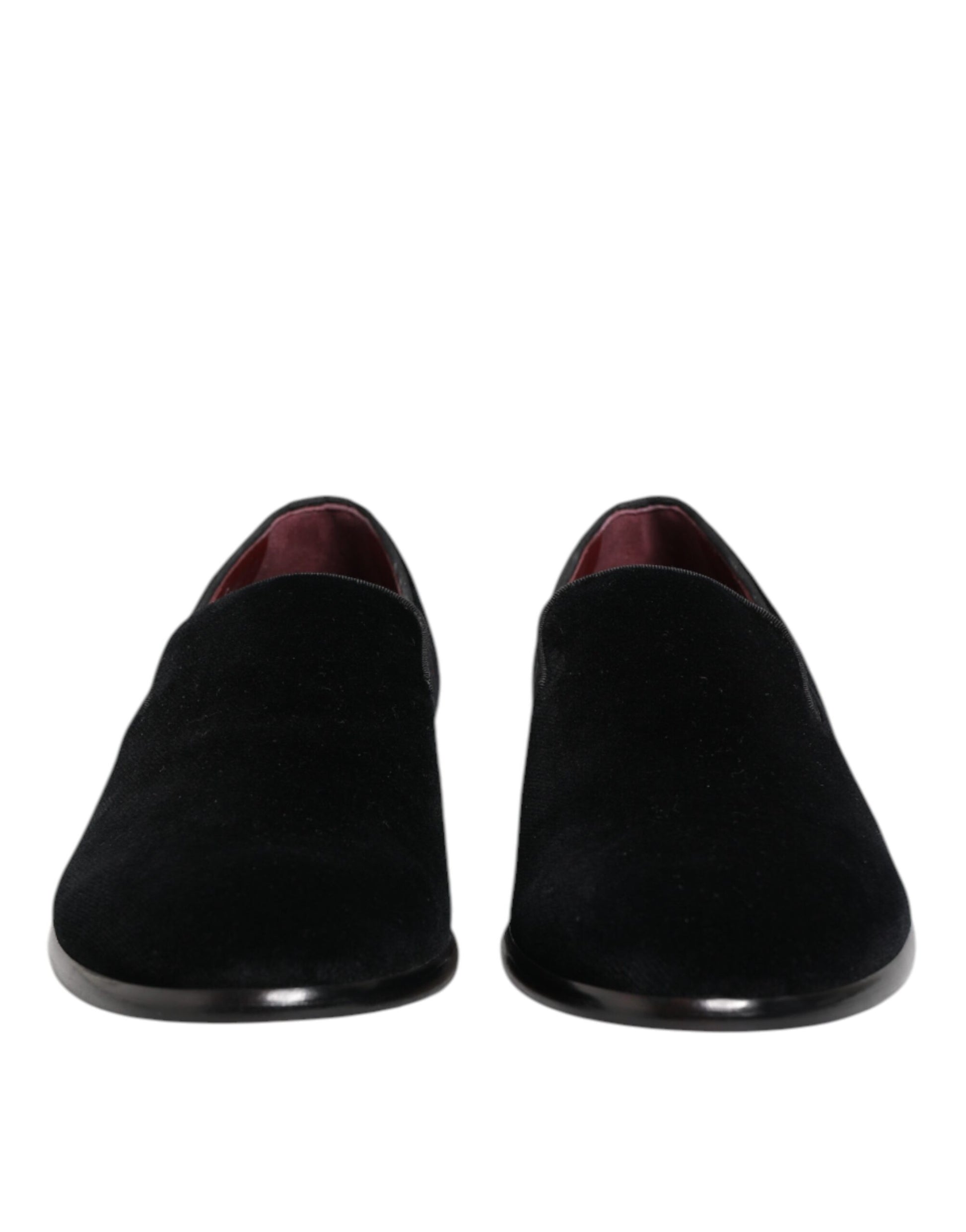 Pair of black velvet loafers with red lining, formal men's dress shoes