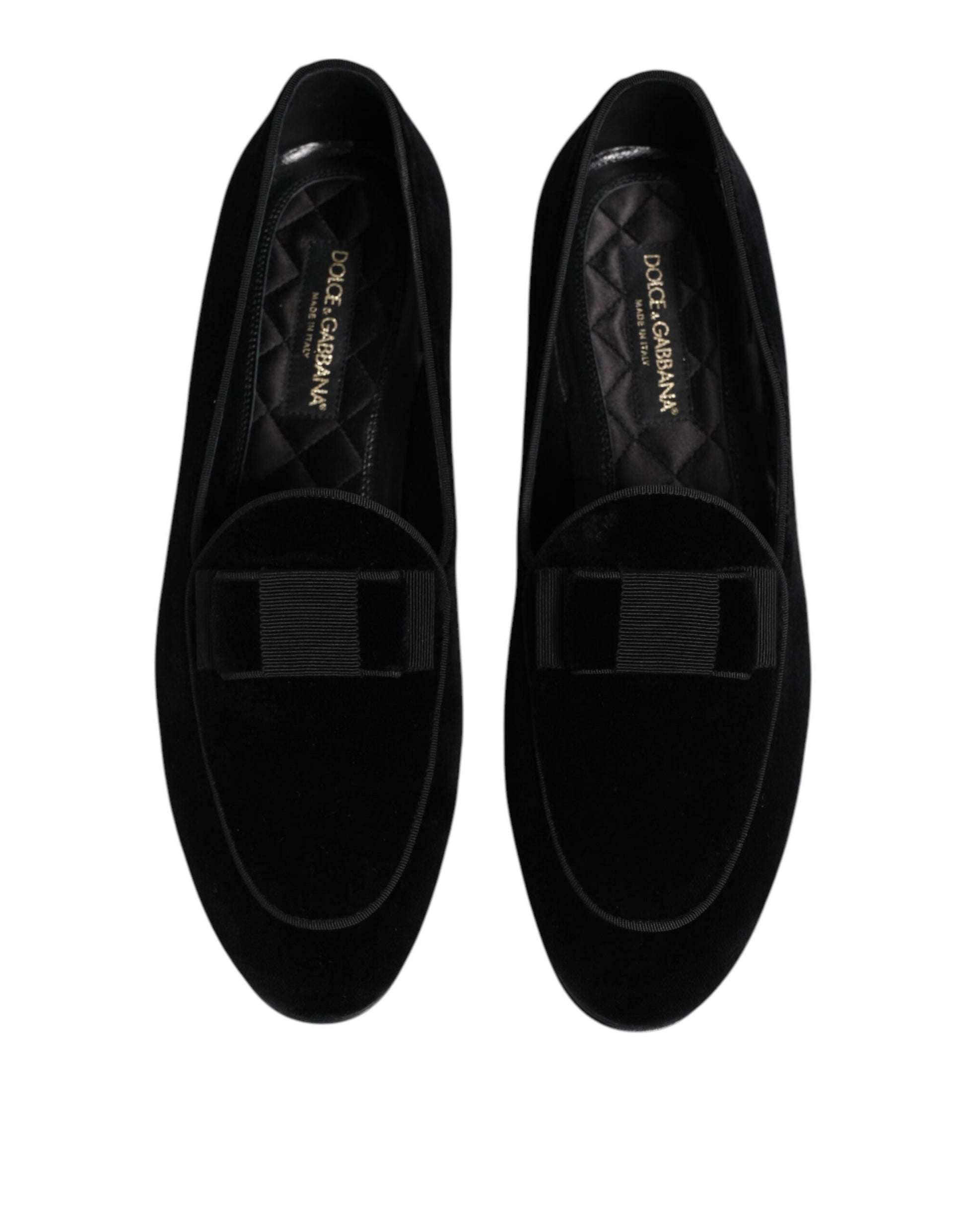 Pair of black velvet loafers with gold buckle, formal men's dress shoes