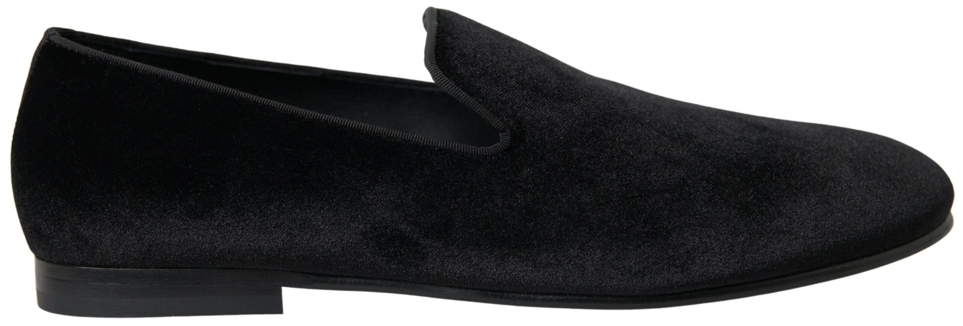 Pair of black velvet loafers with elastic panels and a low heel