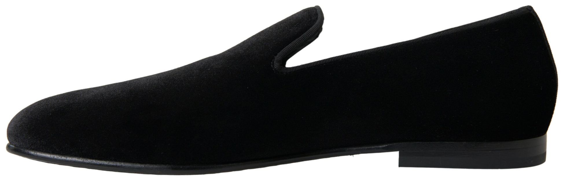 Pair of black shoes with laces and a small heel