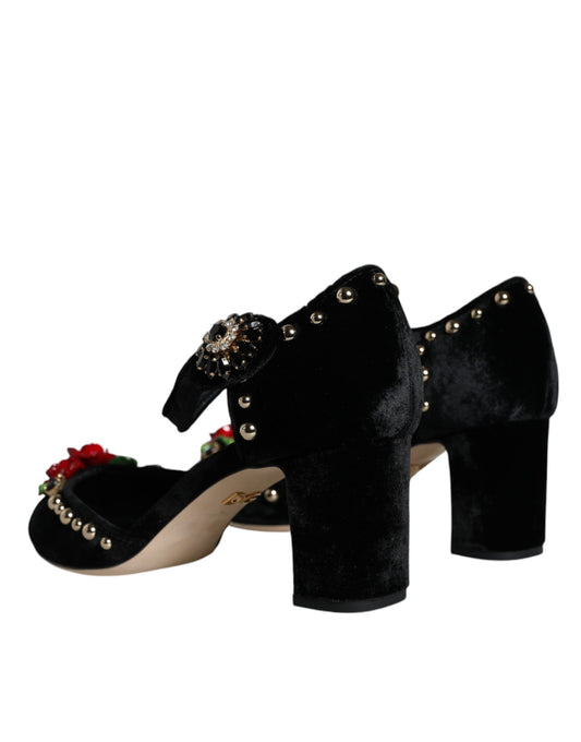 Pair of black velvet shoes with embellishments