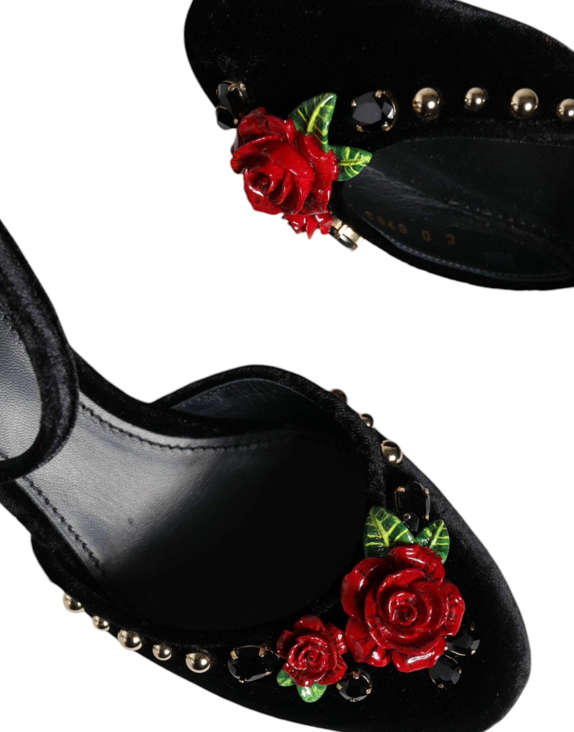 Black velvet shoe with red rose embellishment on heel