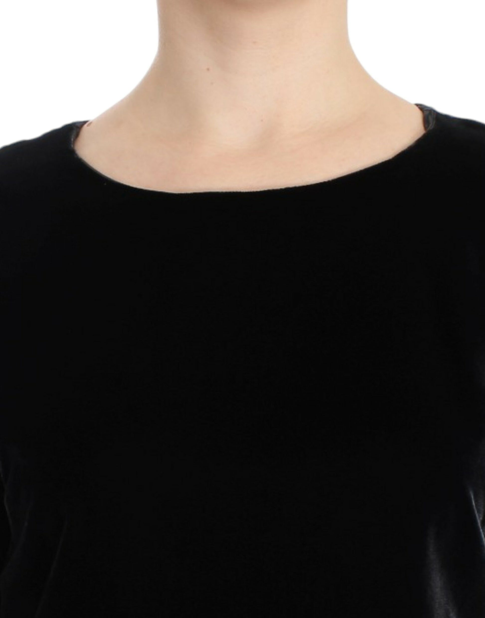 Black sleeveless top on a person