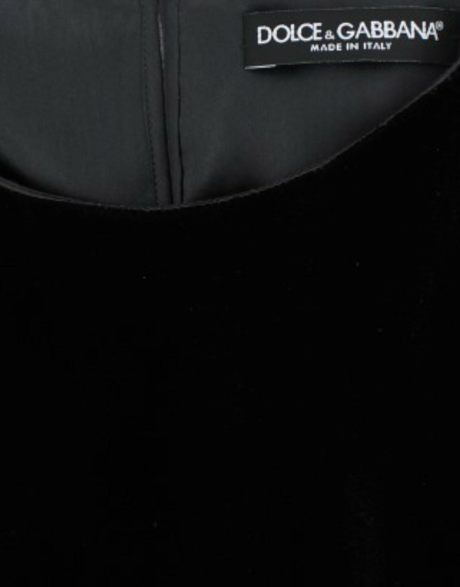Black velvet dress with label on front