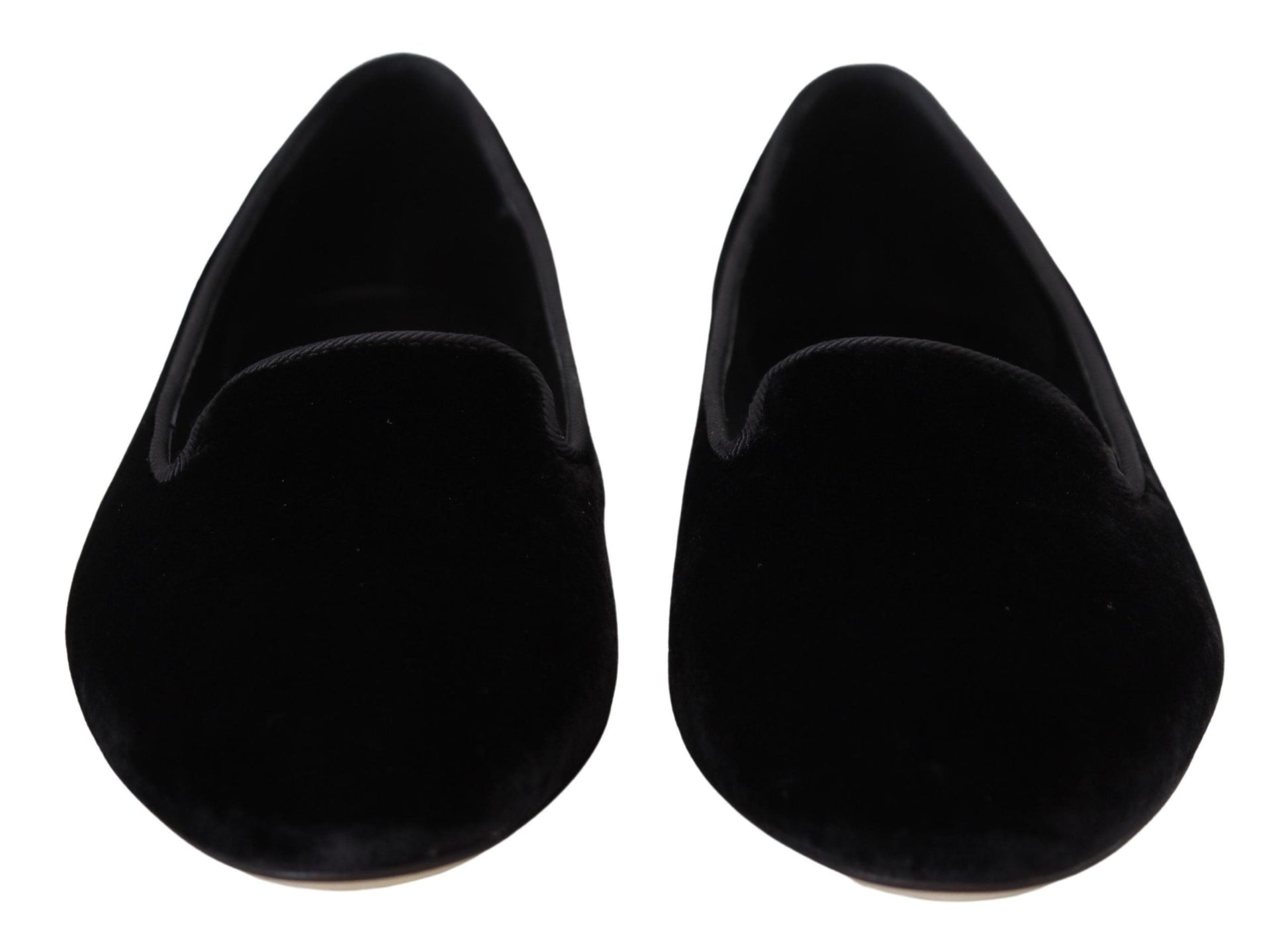 Pair of black velvet shoes with pointed toe and low heel