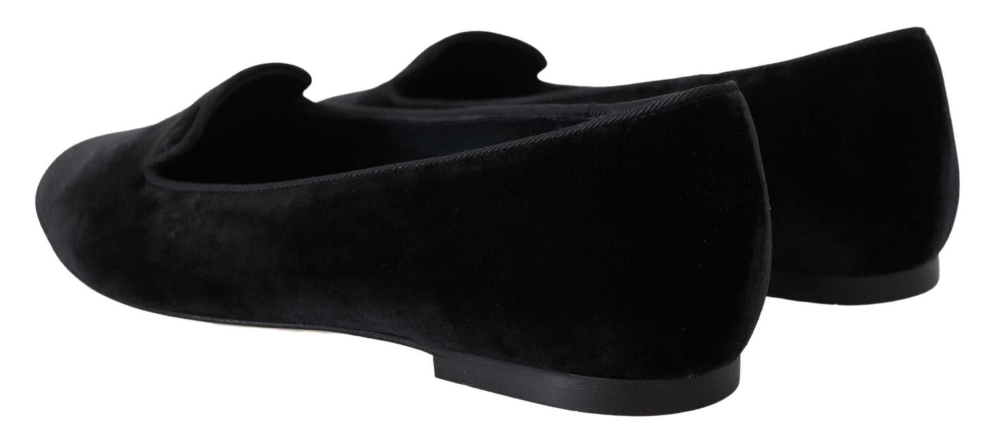 Pair of black shoes with laces and soles
