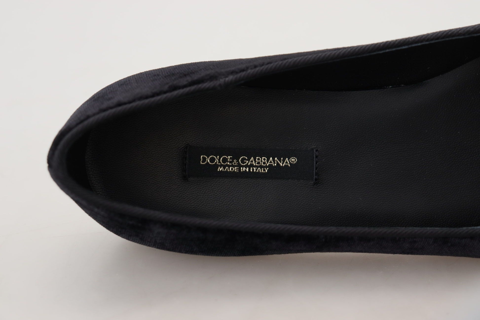 Black shoe with a label inside
