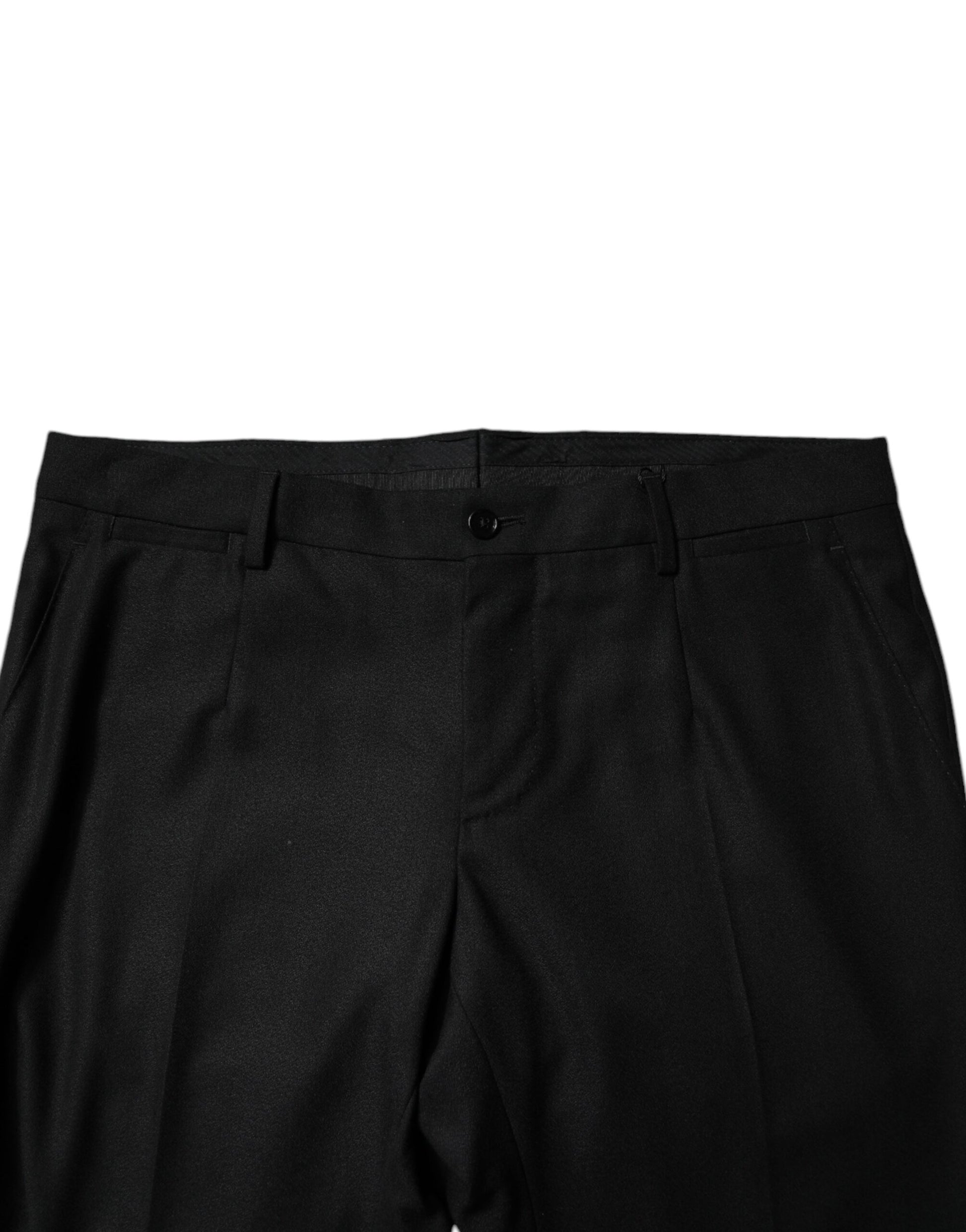 A pair of black virgin wool men's skinny dress pants from the brand Dolce & Gabbana. They are designed for fo