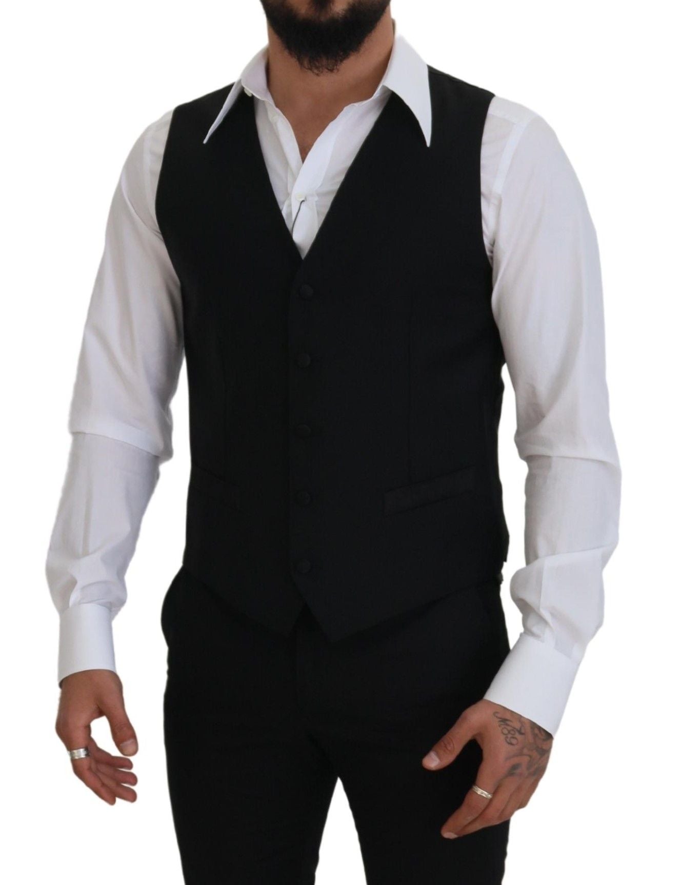A black vest with a white shirt underneath, part of formal wear