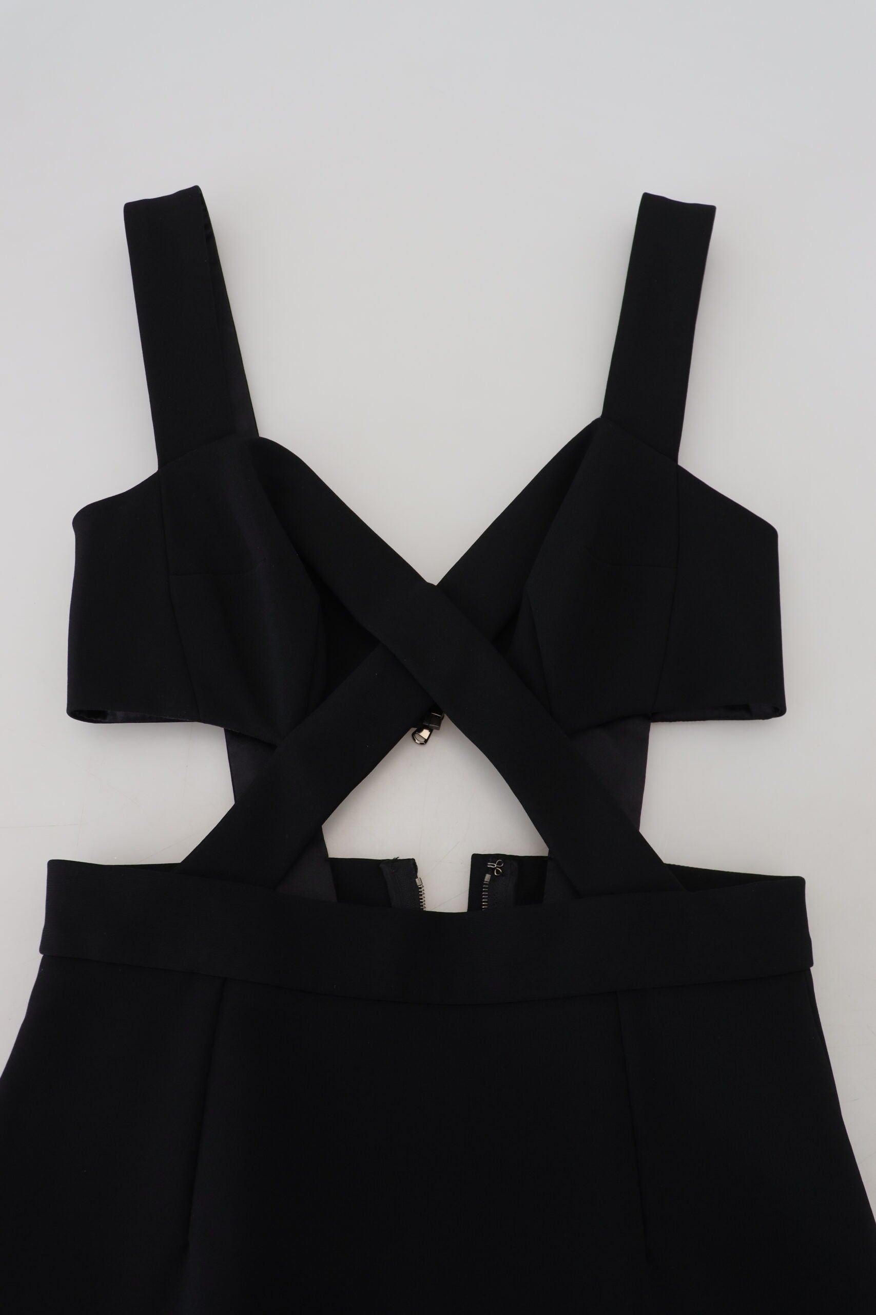 A black viscose bodycon sheath midi dress with a halter neck and cross-over straps