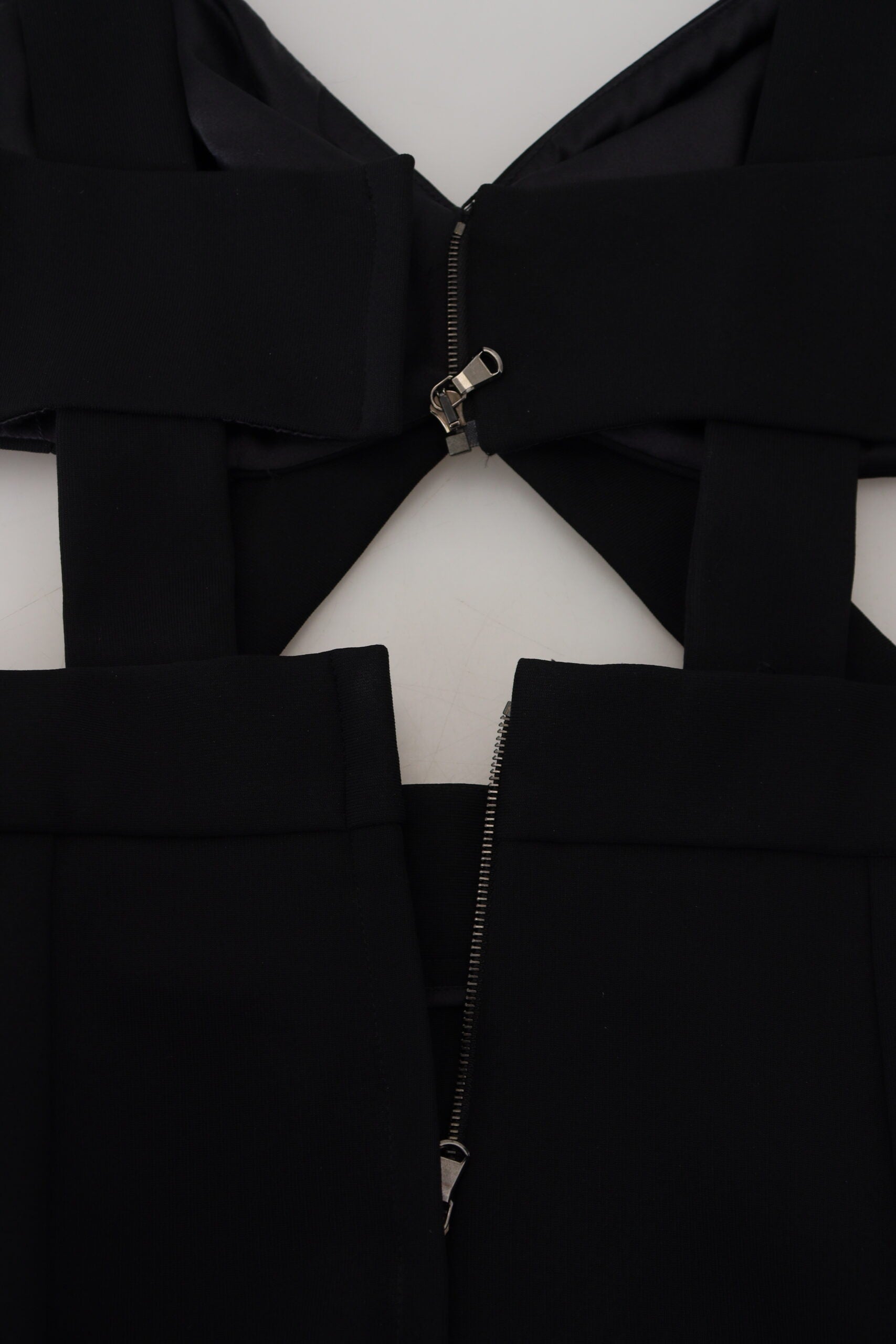A black viscose bodycon sheath midi dress with a zipper in the front