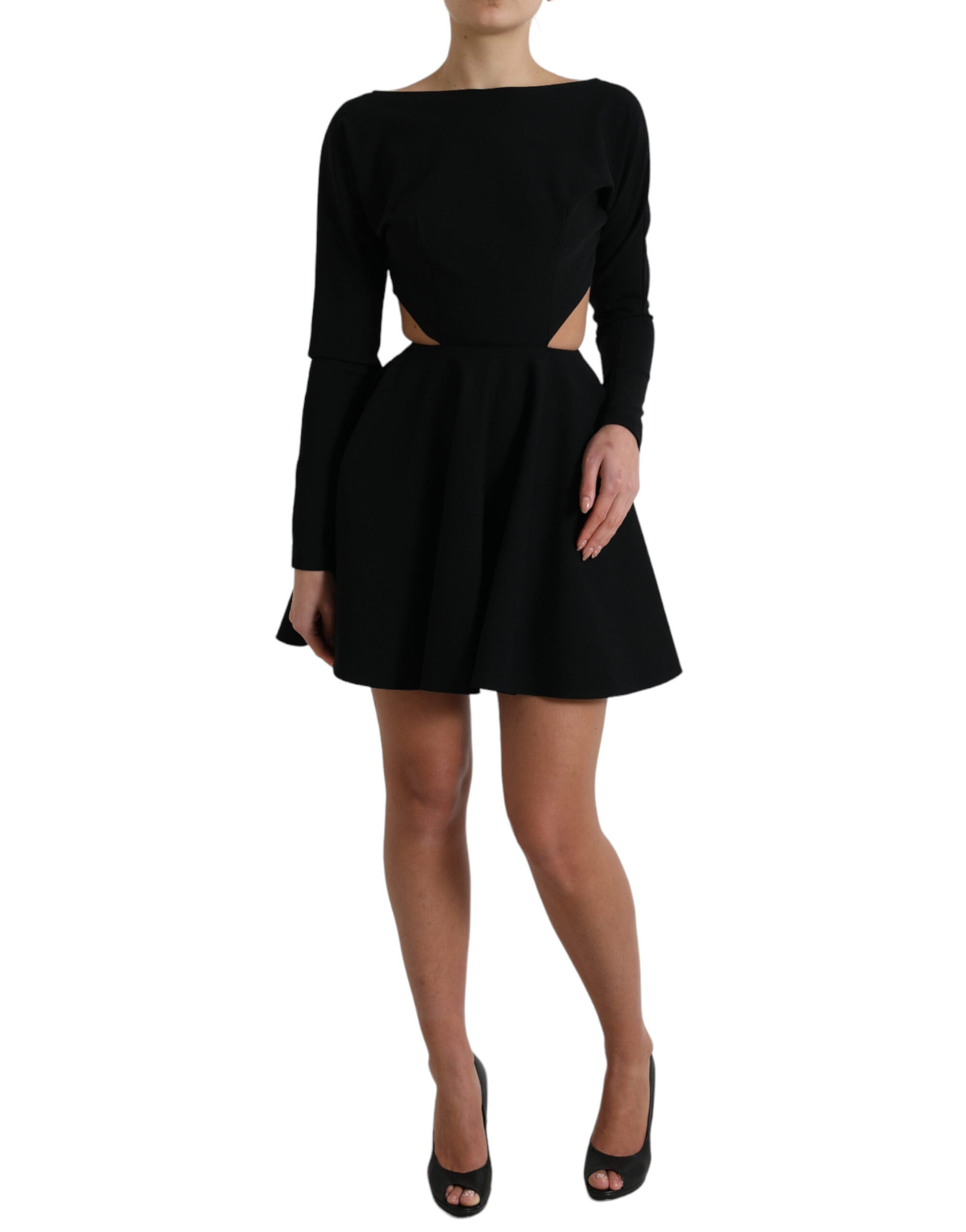 A black viscose cut out dress with long sleeves and an A-line silhouette