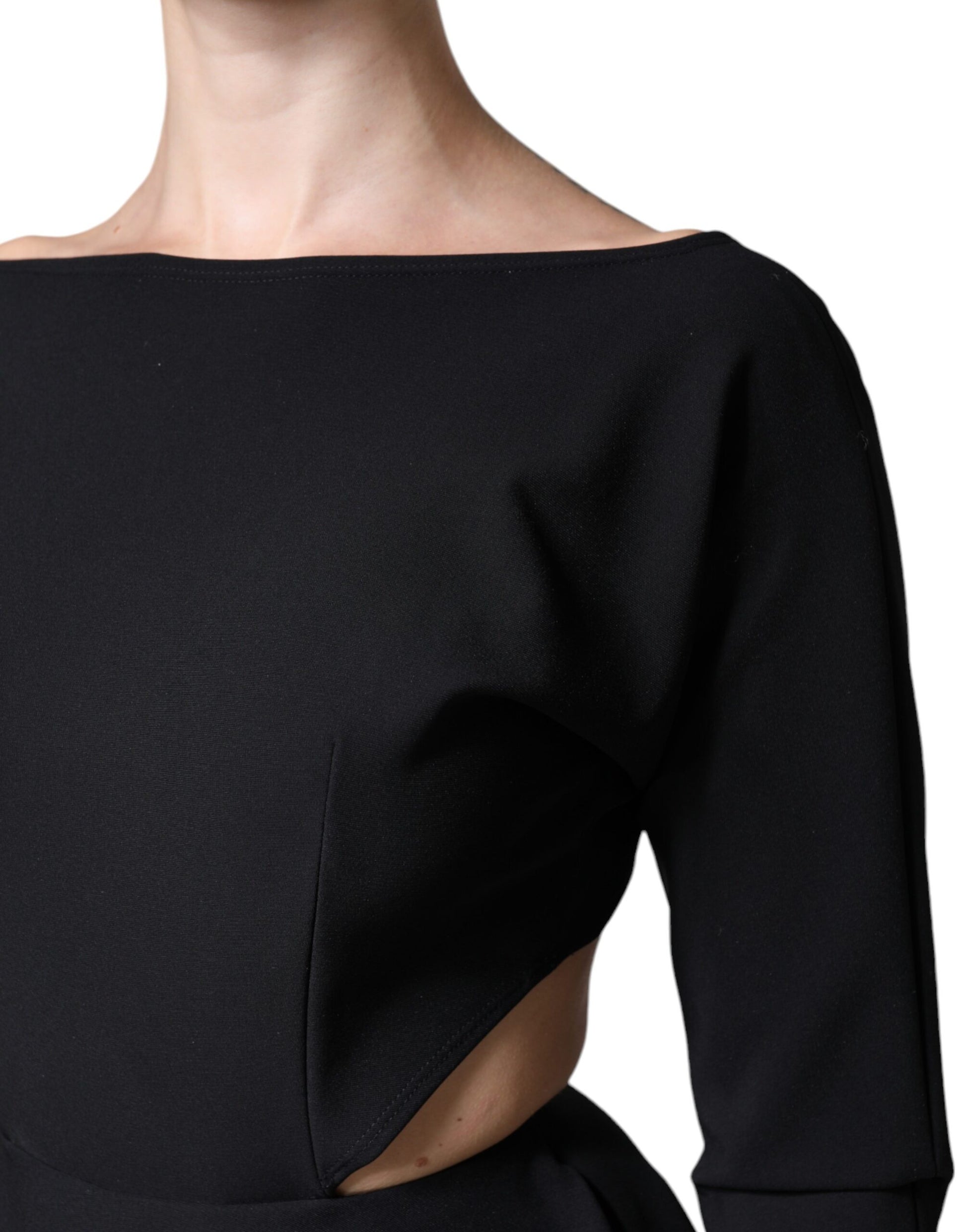 A black viscose cut out A-line long sleeve mini dress