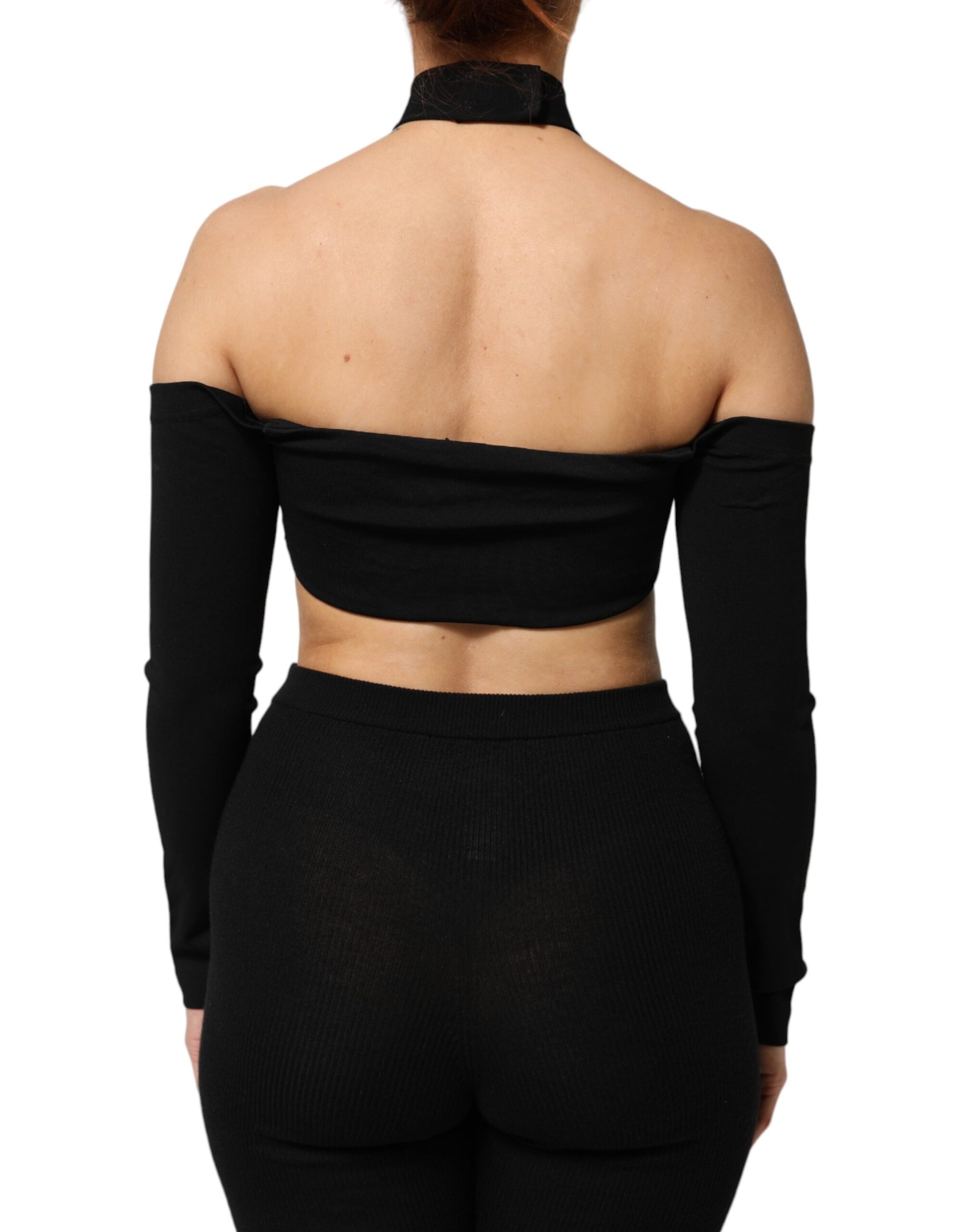 Black crop top with long sleeves and high neckline