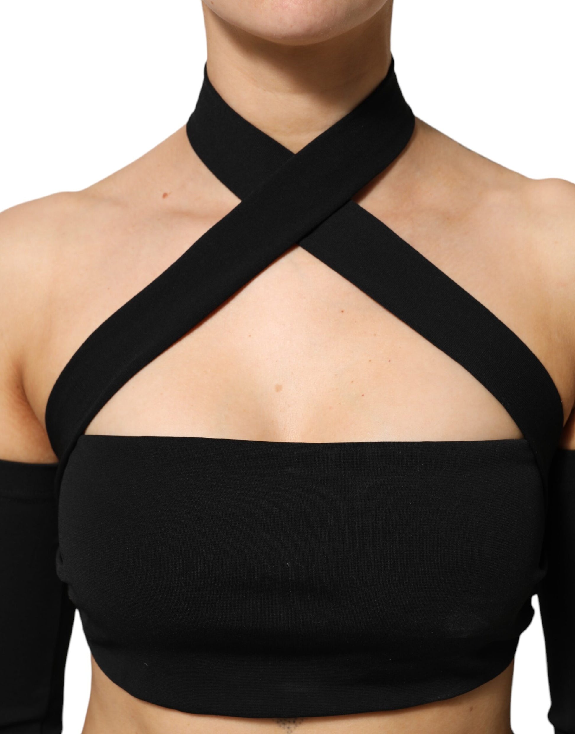 Black strappy top on woman's torso