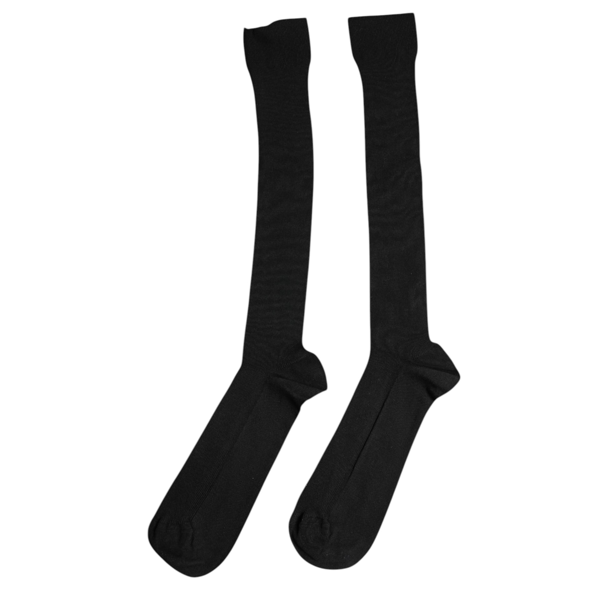 Two black socks on a white background