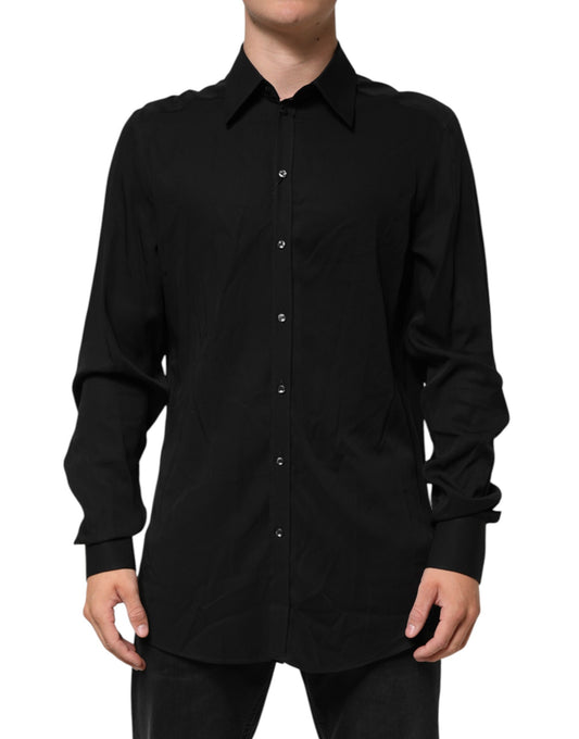 A long sleeved black dress shirt made of viscose fabric, featuring a button-up front and a collar