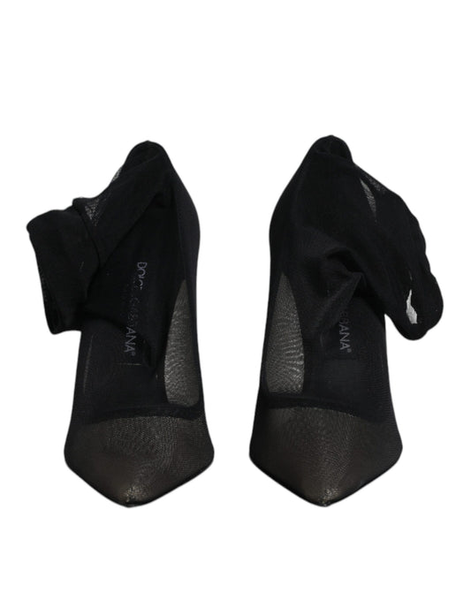 Pair of black socks with white logo