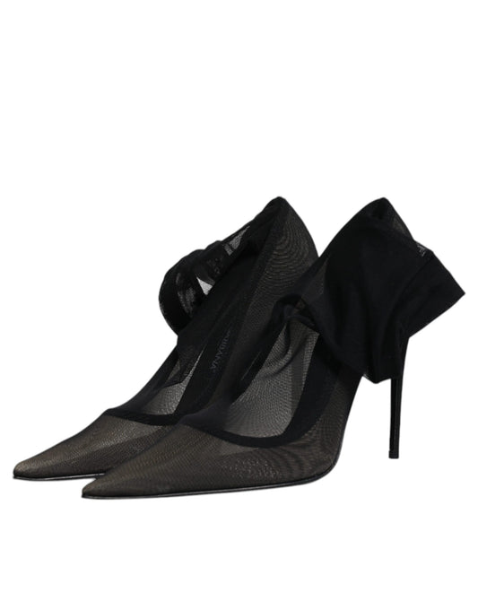 High heel shoes with black straps and a shiny texture