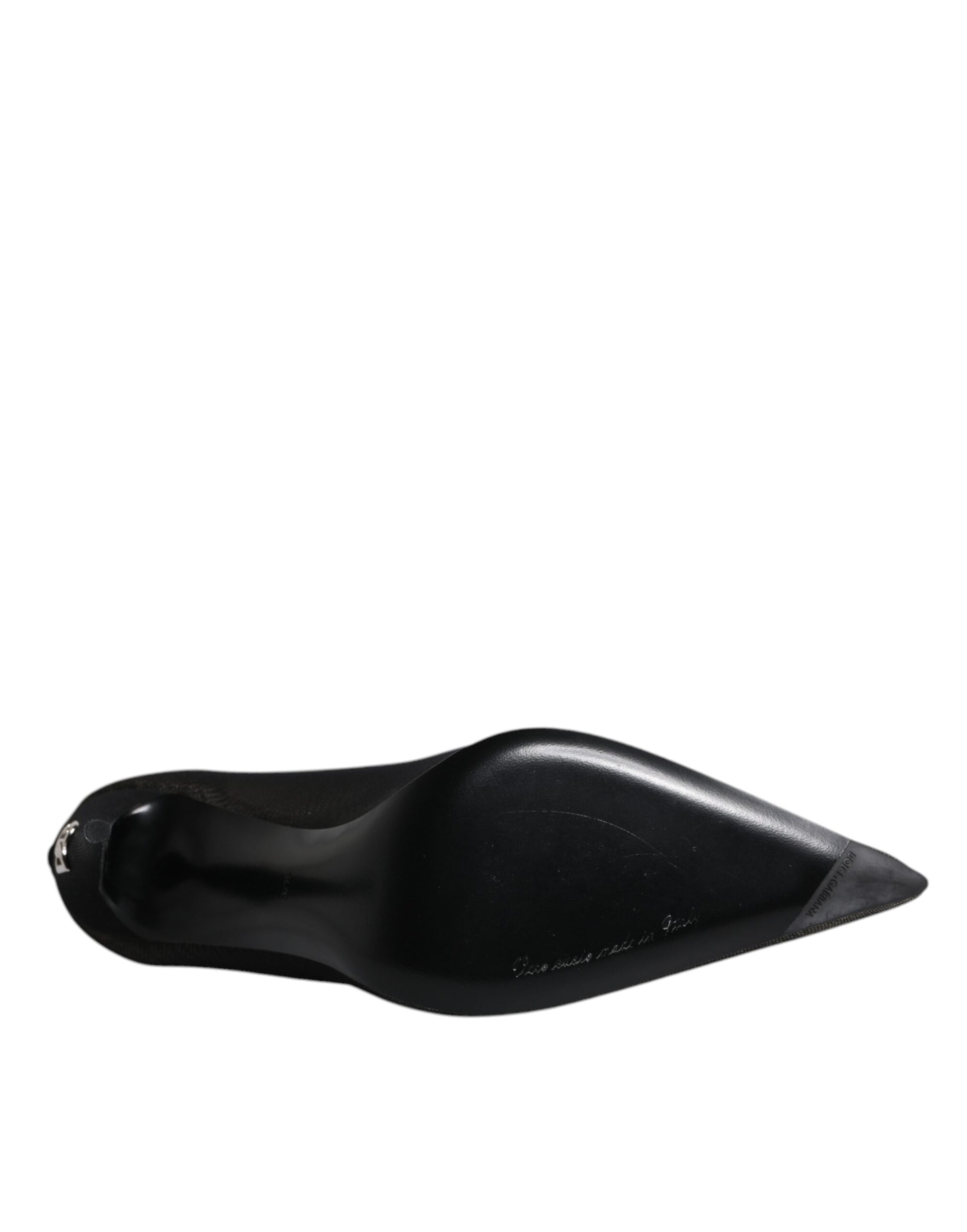 Black plastic object on white background