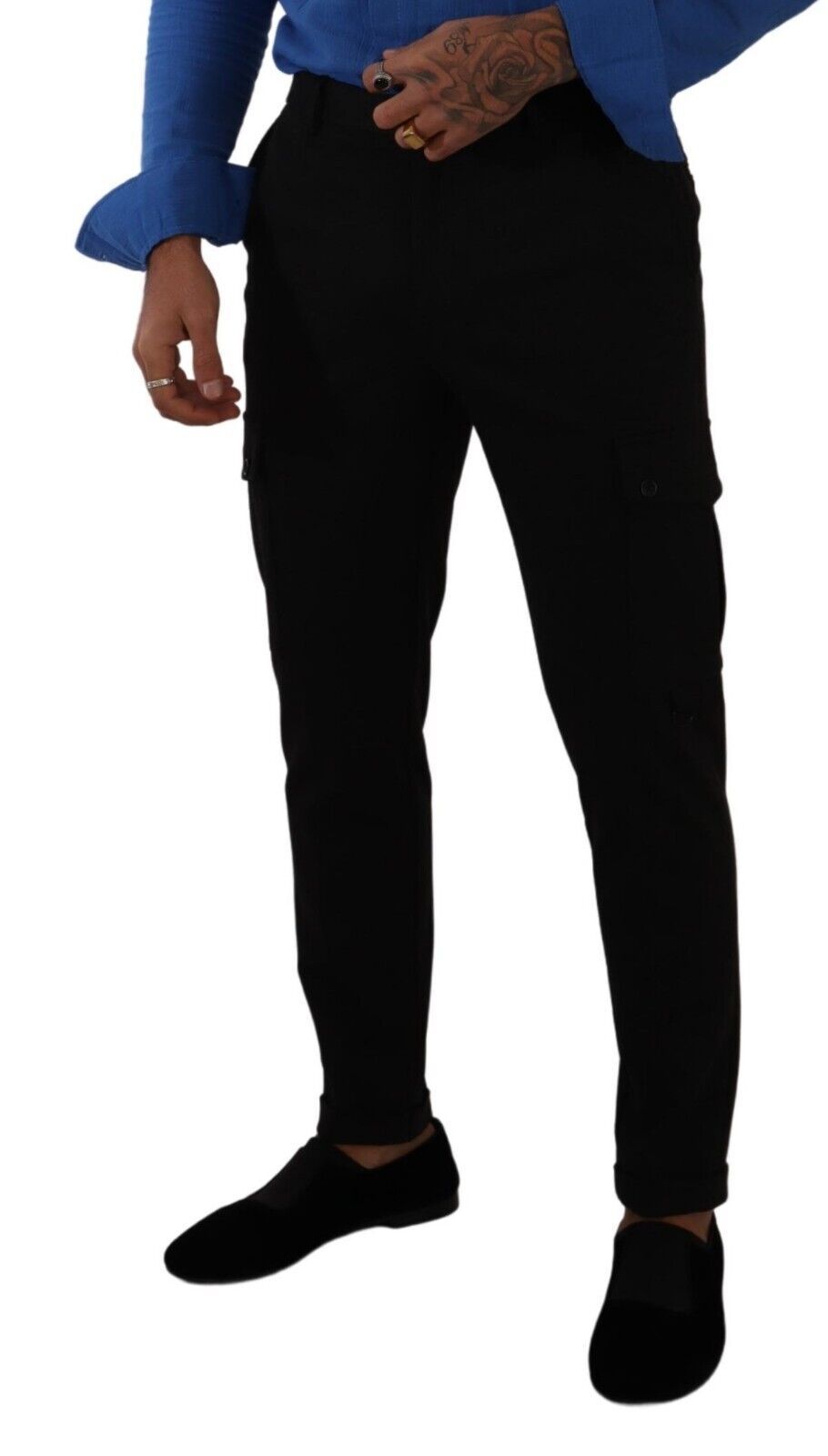 Man wearing black pants and blue shirt