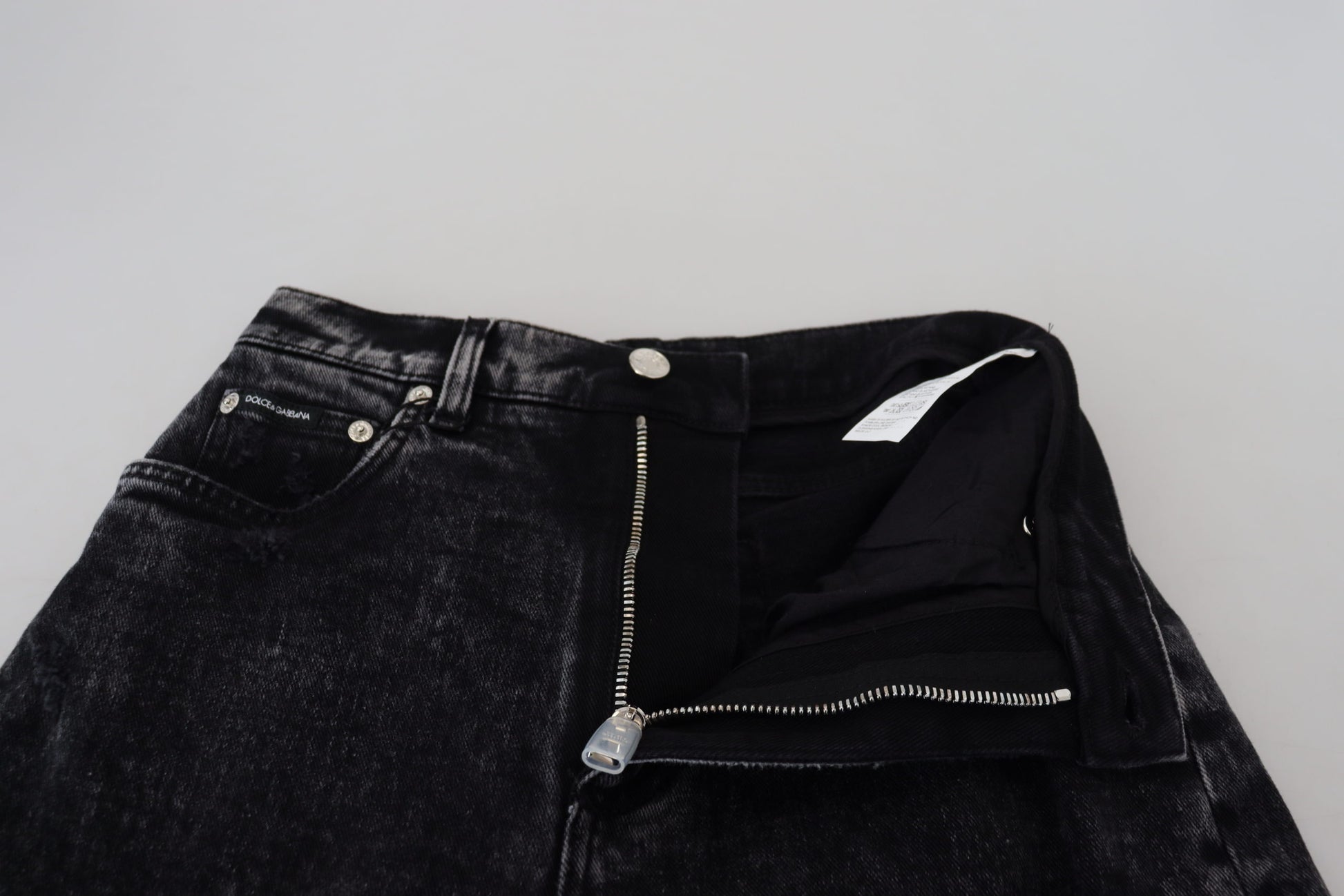 Pair of black jeans with zipper detailing