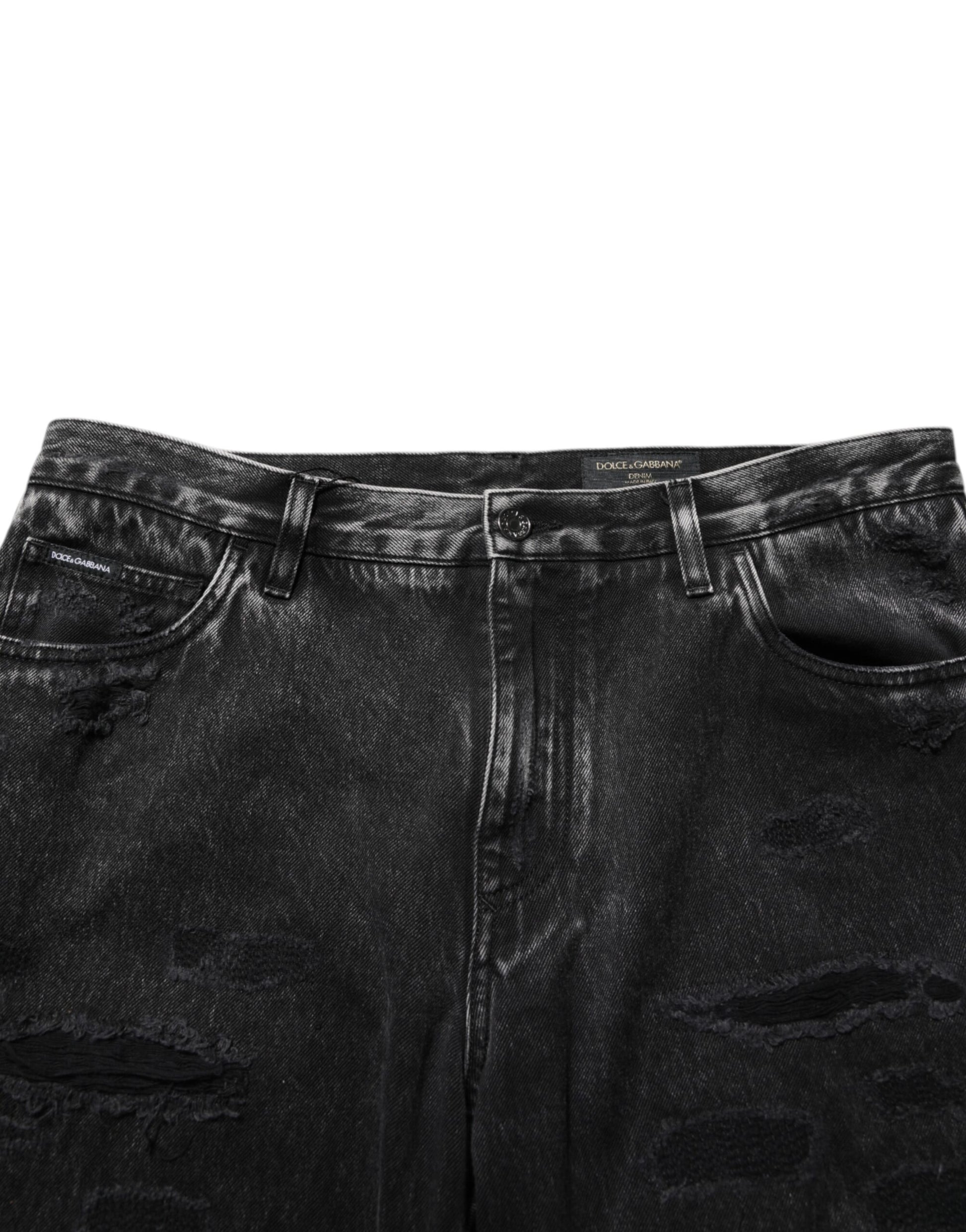 Black denim jeans with distressed details
