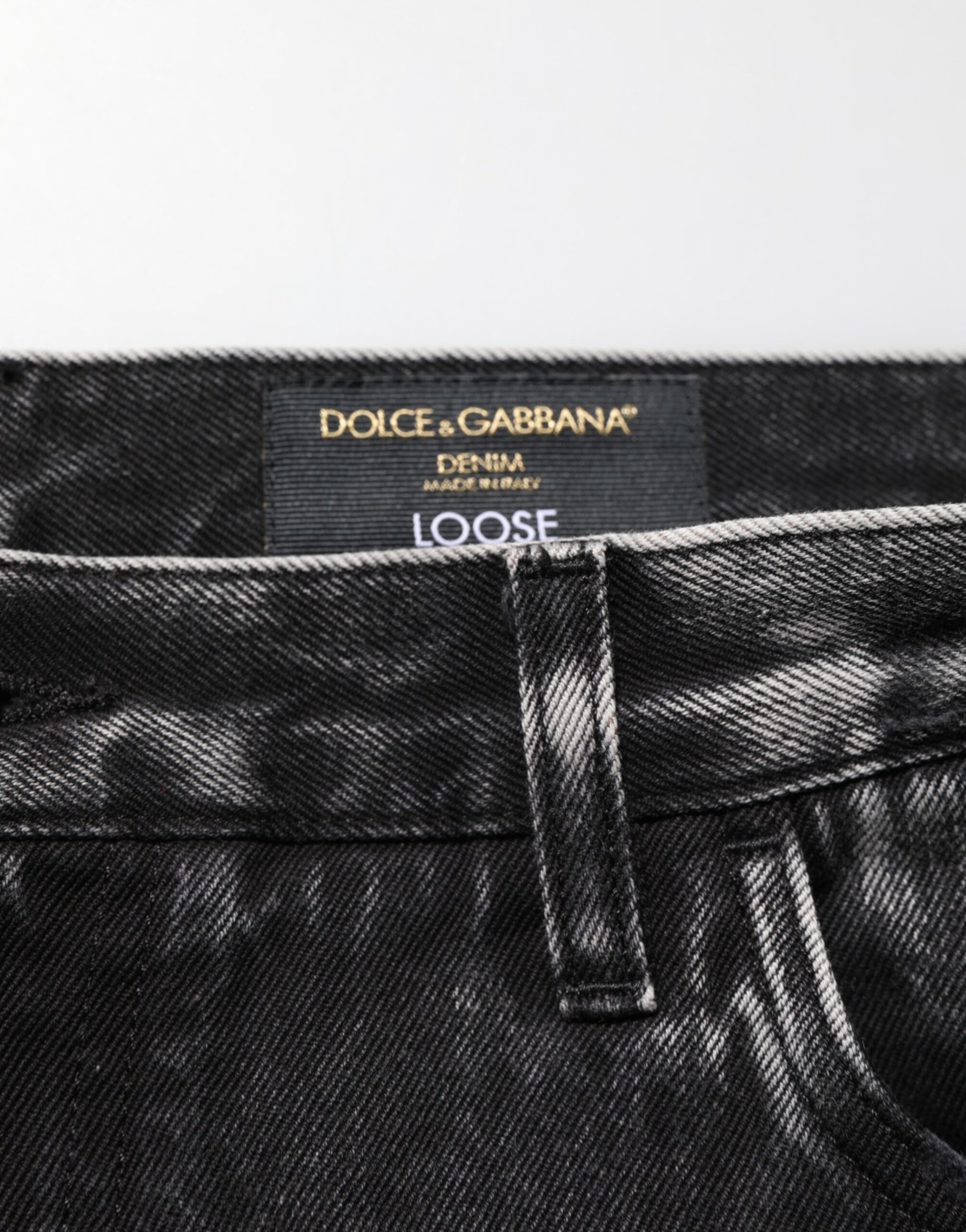 Pair of black jeans with a label on the waistband