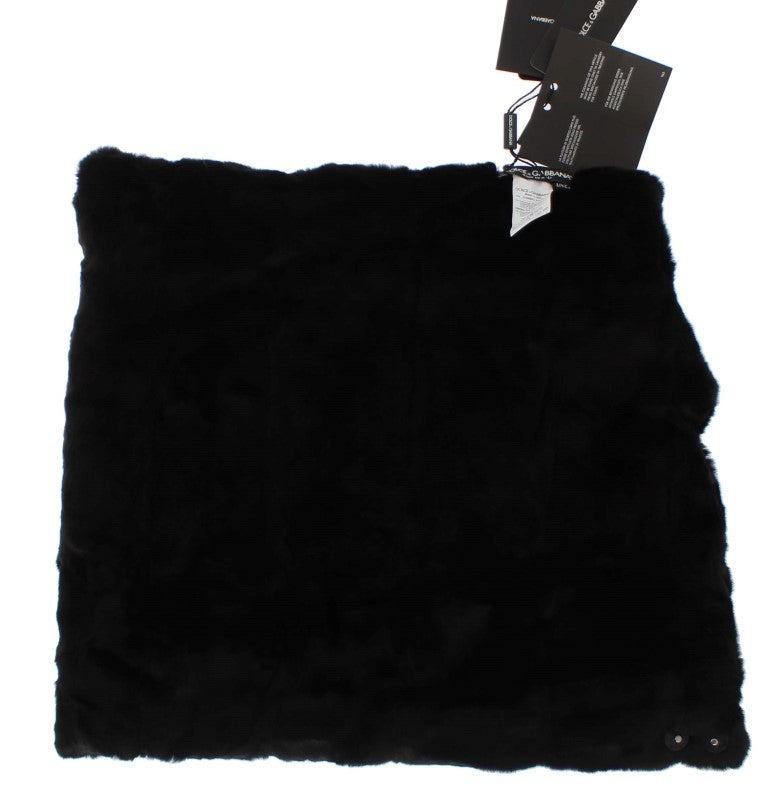 Black furry blanket on white background