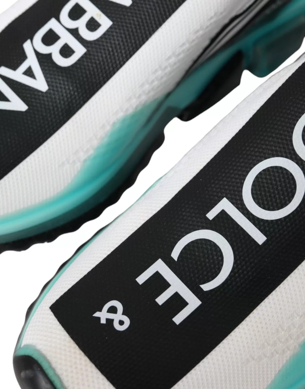 Pair of sneakers with white and black design