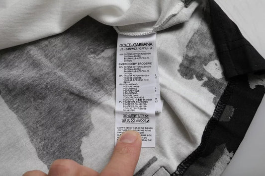 White tag on clothing with black writing