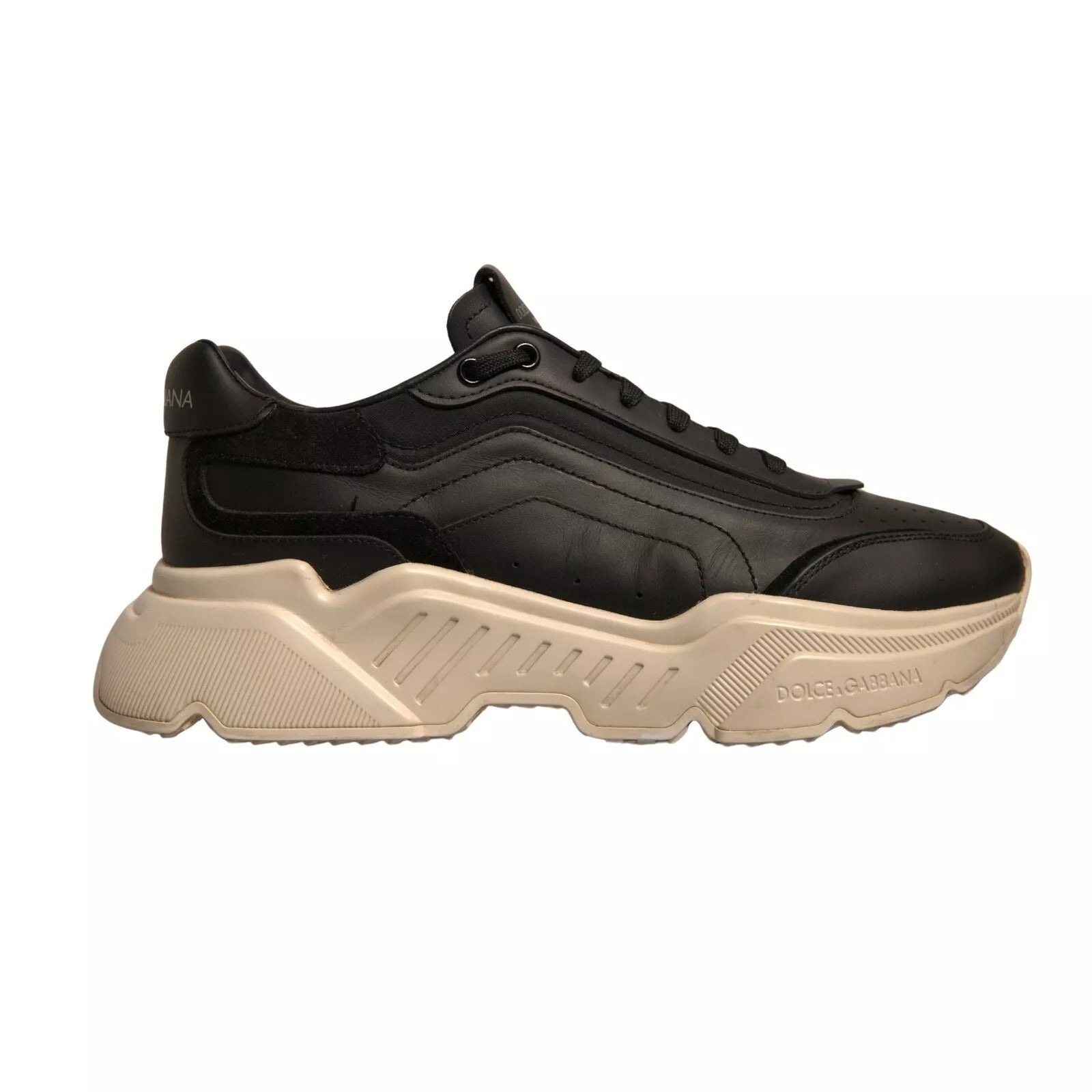 Black sneaker with tan sole