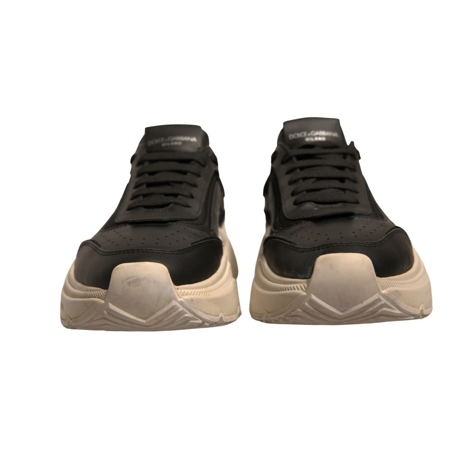 Pair of black and white sneakers