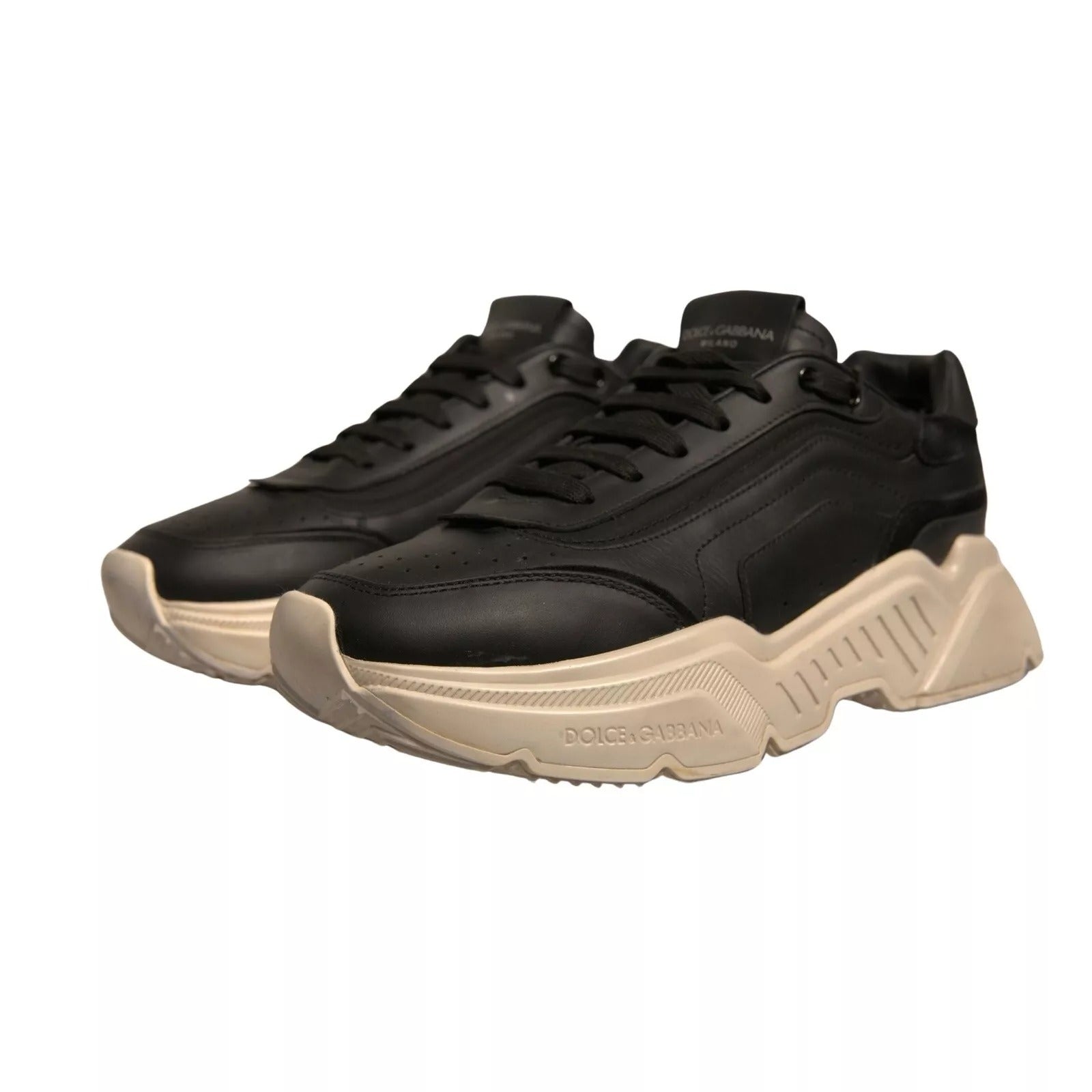 Black sneakers with tan soles