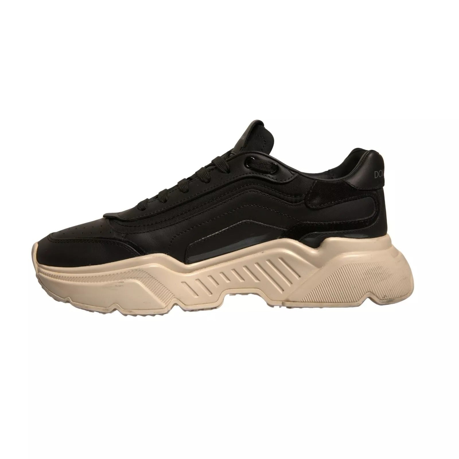 Black and tan sneaker with white sole
